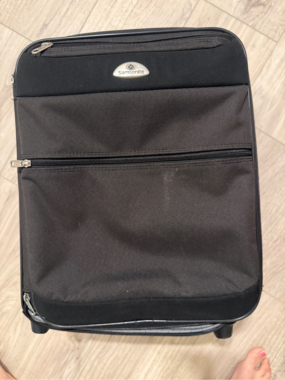 Samsonite Black Men's Carry-On Travel Bag with Front Zip Pocket